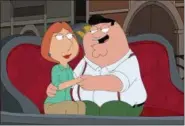  ?? FOX VIA AP ?? This photo provided by Fox shows Lois Griffin, left, whose voice is actress Alex Borstein, with hapless husband Peter, voiced by Seth MacFarlane, in a scene from “Family Guy.”