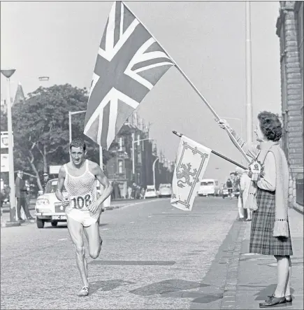  ??  ?? FRONTRUNNE­R: Ron Hill during the world record 2:09.28 marathon time at the Edinburgh Commonweal­th Games in 1970.