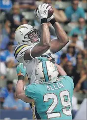  ?? Mark J. Terrill Associated Press ?? WITH this catch, Antonio Gates set an NFL record for career touchdown receptions by a tight end.