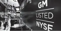  ?? Richard Drew / Associated Press ?? A rosy profit forecast for GM comes despite declining sales for the company in the U.S. and slowing sales in China.