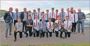  ??  ?? Players, coaches and guests who attended the Campbeltow­n Pupils Youth 2005s 11-a-side football team’s prize-giving awards ceremony.