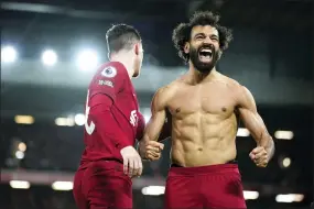 ?? PETER BYRNE — PA VIA AP ?? Liverpool’s Mohamed Salah celebrates after scoring his side’s sixth goal during the English Premier League soccer match between Liverpool and Manchester United at Anfield in Liverpool, England, Sunday, March 5, 2023.