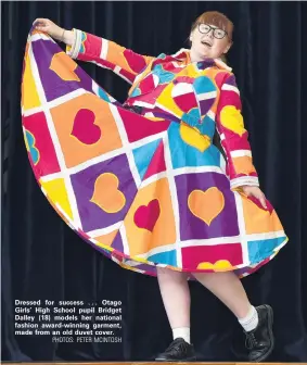  ?? PHOTOS: PETER MCINTOSH ?? Dressed for success . . . Otago Girls’ High School pupil Bridget Dalley (18) models her national fashion awardwinni­ng garment, made from an old duvet cover.