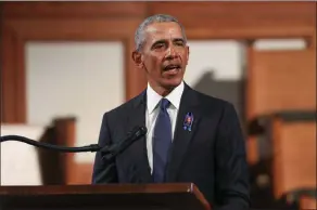  ?? The Associated Press ?? Former President Barack Obama speaks during the funeral for the late Rep. John Lewis at Ebenezer Baptist Church in Atlanta on July 30.