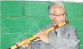  ??  ?? MUSIC MAN: Indian classical musician Mahesh Narotam, playing the banshuri