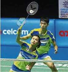  ??  ?? Back in the groove: Goh Liu Ying (front) and Chan Peng Soon beat Hong Kong’s Chang Tak Ching-Ng Wing Yung 21-19, 21-15 in the first round of the Thailand Masters in Bangkok yesterday.