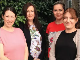  ?? Photo: Eileen O’Connor ?? ABOVE: Bríd Moynahan, Siobhan Burke, Claire O’Keeffe and Ann Marie Duane, some of the artists gearing up for the third Áit Group Exhibition in Newmarket Motors as part of Scullys fest. Running from August 9 to 13, the exhibition opened daily from 12pm...