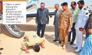  ?? Photo: Fakhr-e-Alam ?? Fakhr-e-Alam kissing the ground in Karachi on Oct 16. His mission began in USA on October 10