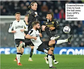  ?? ?? GraemeShin­nie tries to hook the ball away from QPR’s Stefan Johansen.