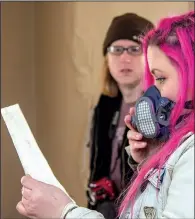  ?? Arkansas Democrat-Gazette/CARY JENKINS ?? Ginger Beck reads from notes about a former patient at the old Alexander Human Developmen­t Center.