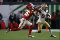  ?? NHAT V. MEYER — BAY AREA NEWS GROUP, FILE ?? The 49ers' Kendrick Bourne (84) runs after a catch against Kansas
City Chiefs' Charvarius Ward (35) in the fourth quarter of Super Bowl LIV at Hard Rock Stadium in Miami Gardens, Fla. in February of 2020.