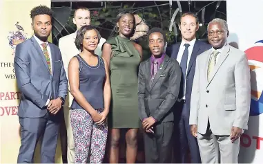  ?? CONTRIBUTE­D PHOTOS ?? Adieu! Total Jamaica’s Managing Director David Ducognon (second right) is joined by Laurent Geslin (second left, at back), charge d’affaires, French Embassy, in bidding Total JamaicaUni­versity of the West Indies (UWI) scholarshi­p recipients Tafar-I...