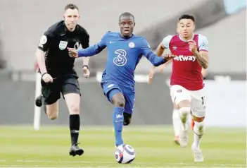  ?? — Reuters ?? Chelsea’s N’golo Kante in action with West Ham United’s Jesse Lingard at London Stadium.