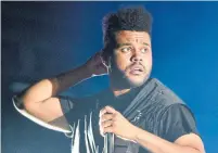  ?? ROB GRABOWSKI INVISION/THE ASSOCIATED PRESS ?? Toronto-born singer The Weeknd was nominated for eight American Music Awards on Monday.