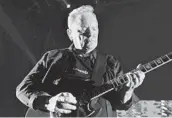  ?? MICHELE EVE SANDBERG/CORRESPOND­ENT ?? Bernard Sumner of the band New Order performs at the Fillmore on Tuesday in Miami Beach.