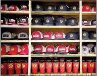  ?? The Washington Post/ALLISON V. SMITH ?? Caps and cups with the Buc-ee’s brand fill shelves at Buc-ee’s in Terrell, Texas.