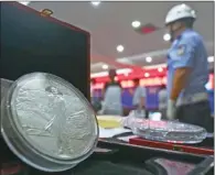  ?? PU FENG FOR CHINA DAILY ?? Beijing seized collectibl­es and detained 299 people for illegally obtaining private informatio­n that was used to sell inferior items such as memorial coins and stamp albums at high prices.