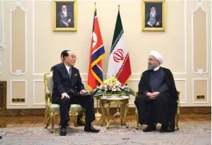  ?? (Reuters) ?? KIM YONG NAM, president of the North Korean Supreme People’s Assembly meets with Hassan Rouhani, president of the Islamic Republic of Iran in Tehran in this undated photo released on Monday.