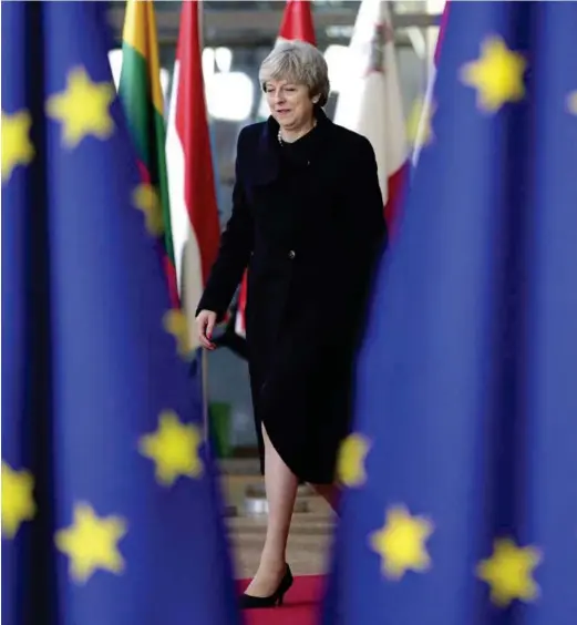  ?? FOTO: OLIVIER MATTHYS, TT/NTB SCANPIX ?? OPTIMIST: Theresa May er ikkje nemneverdi­g påverka av at hennar eige Brexit-departemen­t spår ein kraftig økonomisk smell uansett kva britane endar opp med av tilgang til EU sin fellesmark­nad.