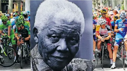  ?? Doug Pensinger/getty Images ?? Tour de France competitor­s behind a giant birthday photo of Nelson Mandela Thursday, before Stage 18 of the famous race.