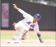  ?? Sarah Stier / Getty Images ?? Michael Conforto of the New York Mets slides into second during the sixth inning at Citi Field against the San Francisco Giants on Thursday in New York.