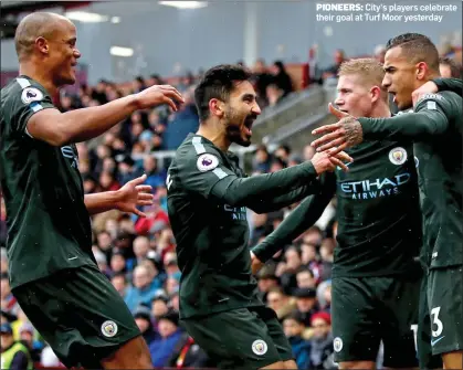  ??  ?? PIONEERS: City’s players celebrate their goal at Turf Moor yesterday