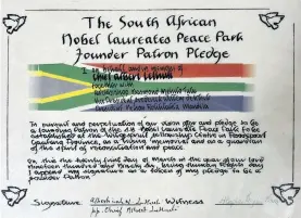  ?? ?? The pledge to create a Nobel peace park at the WFC, signed by a representa­tive of the Luthuli Foundation in 1996. Similar pledges were signed by the other Nobel laureates.
Photo: Mark Heywood