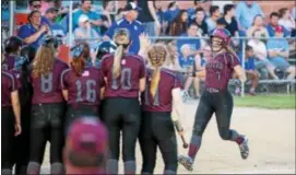  ?? DENNIS KRUMANOCKE­R - FOR DIGITAL FIRST MEDIA ?? Brandywine Heights player wait at home plate for Jess Davidheise­r after her home run in the eighth inning of the county final against Exeter on May 18.
