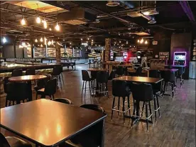  ?? MARK FISHER PHOTOS / STAFF ?? The 12,000-square-foot Miami Valley Sports Bar in West Carrollton reopens today at 4 p.m. after a five-month complete makeover.