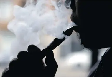  ?? NAM Y. HUH/The Associated Press ?? Canadian scientists need Health Canada’s green light for studies on e-cigarettes because nicotine-containing e-cigarettes
are currently outlawed. But one scientist says the department is treating the products like an experiment­al drug.