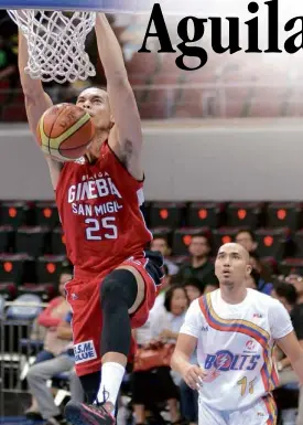  ?? AUGUST DELA CRUZ ?? JAPETH Aguilar of Barangay Ginebra slams one in as Meralco’s Mike Cortez watches helplessly.