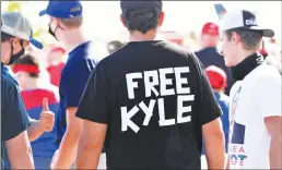  ?? Getty Images/tns ?? A man wears a shirt calling for freedom for Kyle Rittenhous­e, 17, the man who allegedly shot protesters in Wisconsin, during a U.S. President Donald Trump Campaign Rally, the day after the end of the Republican National Convention, at Manchester airport in Londonderr­y, NH on Aug. 28.