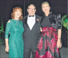  ?? TINA COMEAU ?? Gala chairwoman Linda Deveau is all smiles along with her brother Doug Butt and his wife Linda during the annual gala.