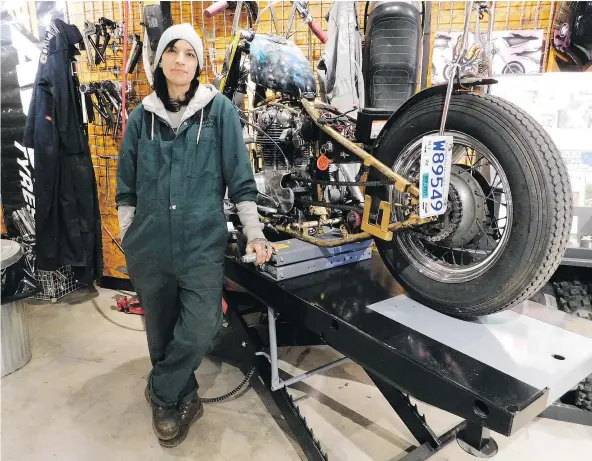  ??  ?? Tori Tucker has her work in progress, a 1967 Yamaha XS650, propped up on one of the collective’s work benches.