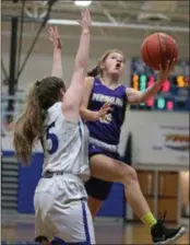  ?? RANDY MEYERS — FOR THE MORNING JOURNAL ?? Vermilion’s Clara Smith drives past Midview’s Meghan Newton for a layup during the first quarter on Dec. 27.