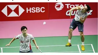  ??  ?? Close: Japan’s Yuta Watanabe (left) and Keigo Sonoda in action against China’s Li Junhui and Liu Yuchen. They lost 21-17, 19-21, 20-22 to give China a 3-1 victory in the Thomas Cup final. — AP