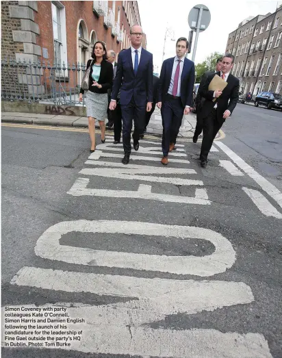  ?? Photo: Tom Burke ?? Simon Coveney with party colleagues Kate O’Connell, Simon Harris and Damien English following the launch of his candidatur­e for the leadership of Fine Gael outside the party’s HQ in Dublin.