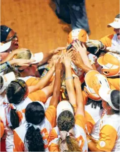  ?? PHOTO BY SCOTT KELLER/THE DAILY TIMES VIA AP ?? The Tennessee softball team celebrates a grand slam by Megan Geer in Sunday’s game against Florida in Knoxville. The Gators, who already had two wins in the bank at the start of Sunday’s game, had the potential to sweep Tennessee. However, Geer’s slam...