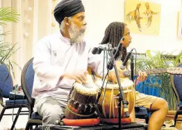  ??  ?? Maroghimi plays the tablas, with Amri Harris on guitar, at ArtBeats fifth annual fine arts showcase at The Jamaica Pegasus hotel.