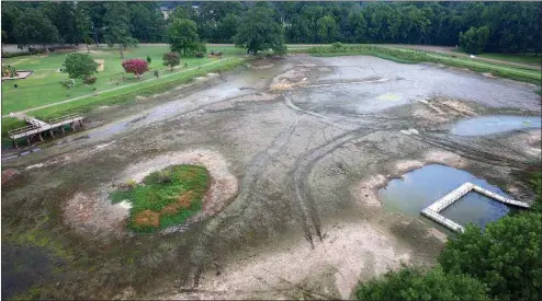  ?? Submitted photo ?? Texarkana, Texas, has begun a project to rejuvinate the pond at Spring Lake Park through drainage and dredging, making it deeper again at all points and stabilizin­g it. Once done, it will be a much nicer and healthier place for the animals that live...