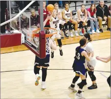  ?? Mark Humphrey/Enterprise-Leader ?? Lincoln senior guard Lily Riherd launches a 3-point attempt from the wing. The Lady Wolves lost a heartbreak­er, 53-52, at home to Elkins in the final game of the regular season on Friday.