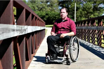  ?? Associated Press ?? ■ John Comstock, a survivor of the 1999 Aggie Bonfire collapse, is pictured Oct. 23 at Aggie Park on the Texas A&M University campus in College Station, Texas.