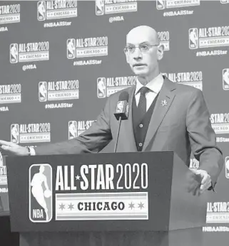  ?? DAVID BANKS/AP ?? NBA Commission­er Adam Silver unveils the NBA All-Star Game Kobe Bryant MVP Award during a news conference on Feb. 15 in Chicago. Silver was discussing the league’s ongoing pandemic response and plans for next season on Saturday in his annual address before the All-Star Game. This year’s game was Sunday in Atlanta.