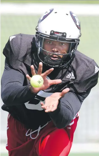  ?? JEAN LEVAC ?? Defensive back Corey Tindal takes part in a drill during Ottawa Redblacks rookie camp at TD Place on Thursday. The prospect has struggled in the last decade after losing three members of his family.