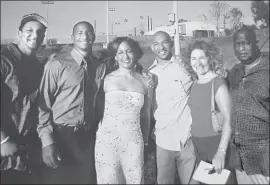  ?? Ellison family photos ?? THE ELLISON FAMILY was all smiles when Kevin graduated from Redondo Union High in 2005. From left are Keith Ellison, Kevin, Camille Ellison, Chris Ellison, Judy Reisner (mother) and Charles Ellison (father).