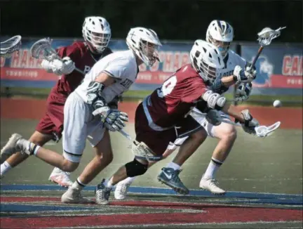  ?? GENE WALSH — MEDIANEWS GROUP ?? St. Joe’s Prep’s Trey Fruncillo reaches for the ball against La Salle on Friday.