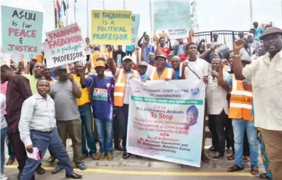  ??  ?? Members of the Academic Staff Union of Universiti­es protest in front of the Lagos State House of Assembly, over alleged harassment of union leaders by the management of Lagos State University, in Lagos yesterday Benedict Uwalaka