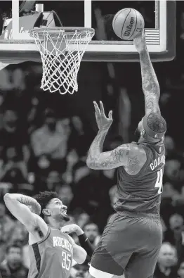  ?? Matthew Stockman / Getty Images ?? DeMarcus Cousins (4) played 25 games for the Rockets last season, and the now-Nuggets reserve got the start against his former team Friday night.