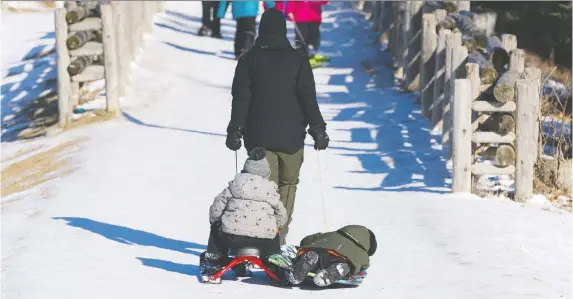  ?? ERROL MCGIHON ?? Kanata Hill was the site of some outdoor fun on Friday, but Premier Doug Ford says more measures are coming to the province as Ontario records high COVID-19 numbers.