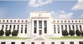  ?? PHOTO: REUTERS ?? The Federal Reserve sees gross domestic product growing 2.8 per cent this year, slightly higher than previously forecast, and dipping to 2.4 per cent next year — unchanged from policymake­rs’ March projection­s